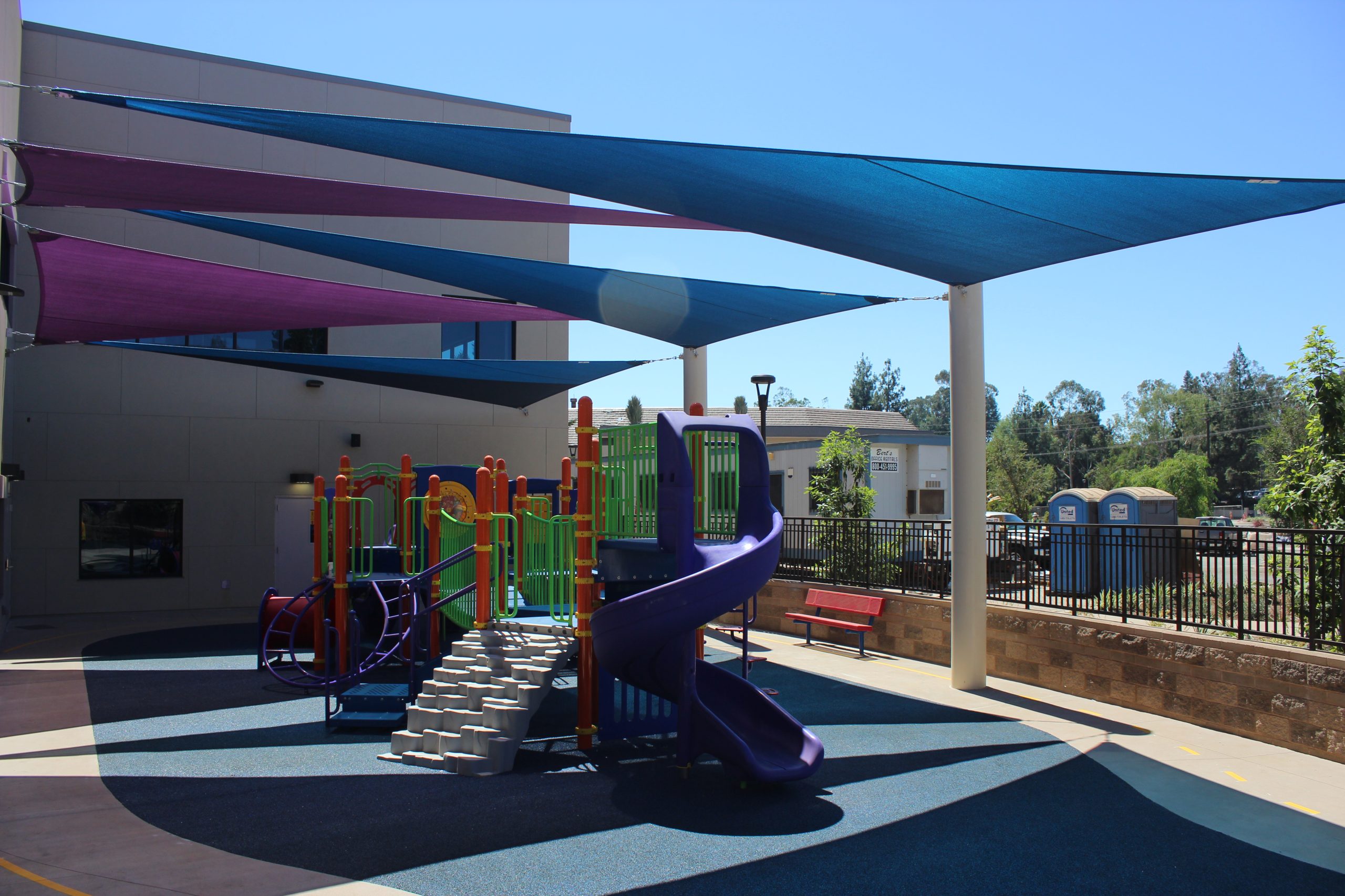 Demonstrates the effectiveness of the shade structure at Emmanuel Faith.