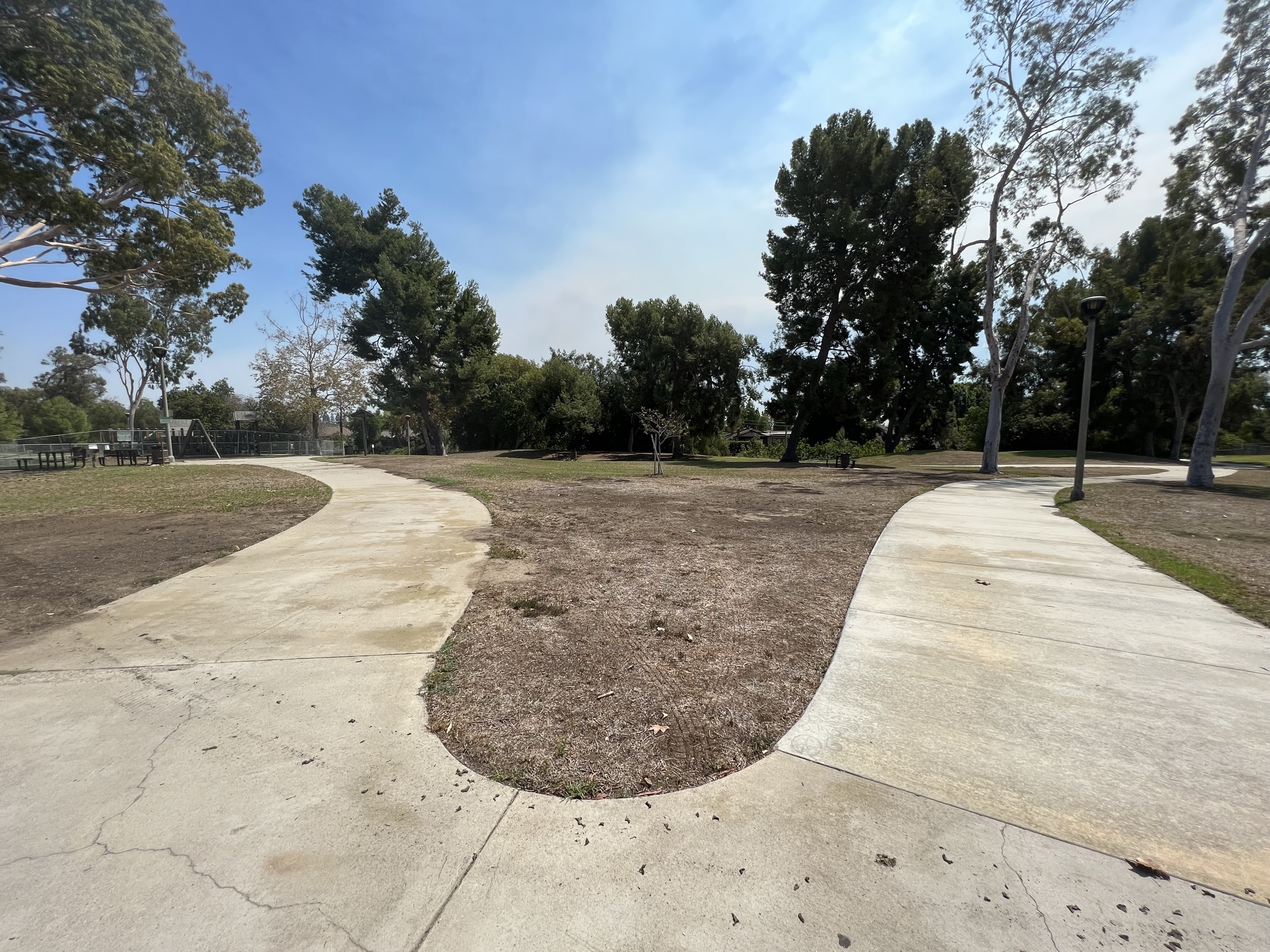 Area at Acacia Park before the new Fullerton playground installation, showing the relocated playground site