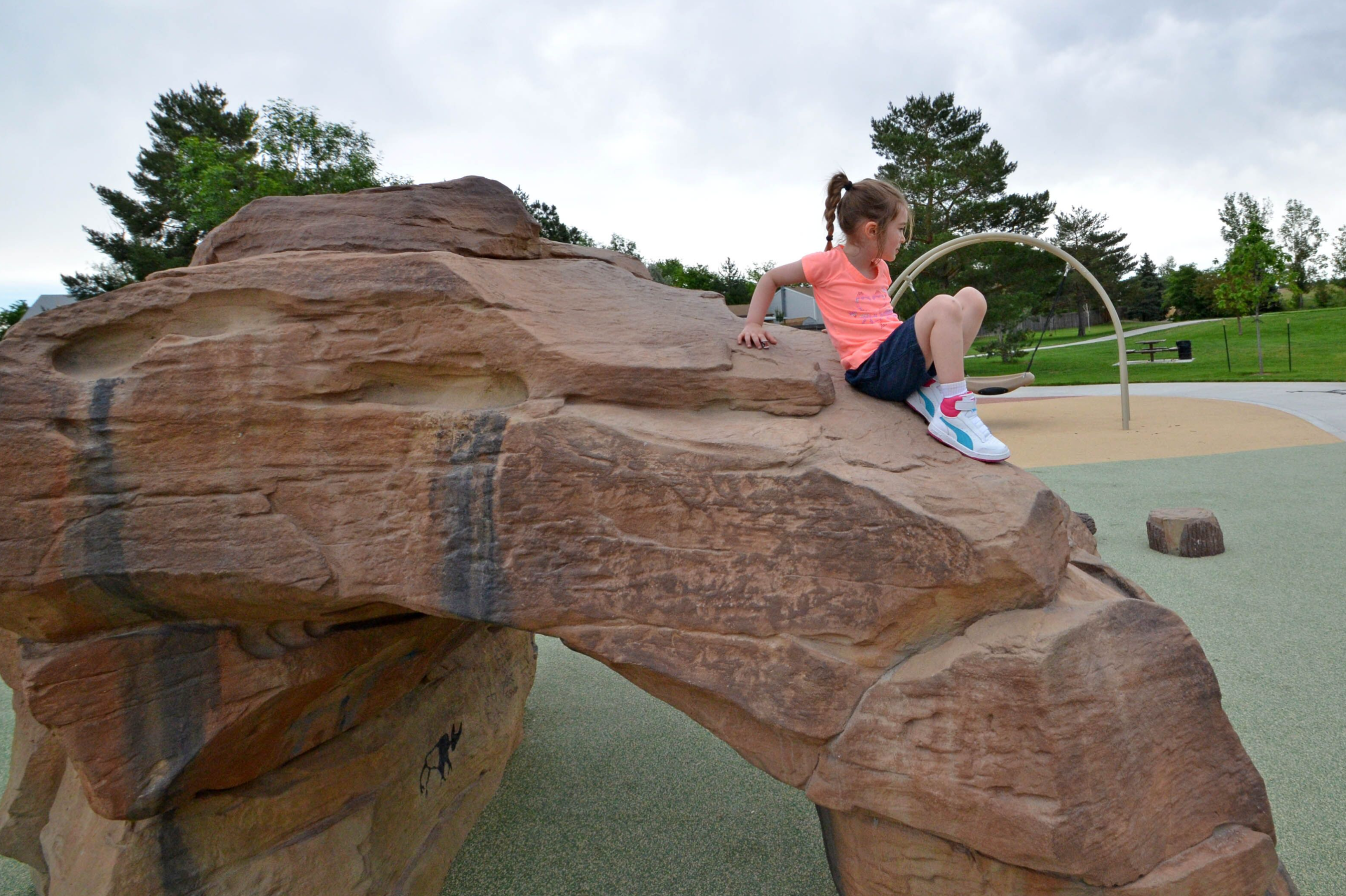 ID Sculpture rock climber featuring crawl spaces and climbing zones for children