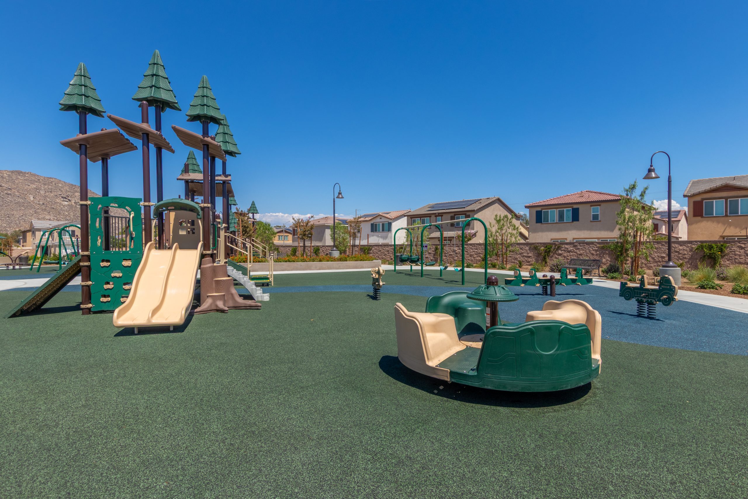 Spring riders and spinner equipment installed at La Pradera North Park, adding movement and variety to the Winchester playground.
